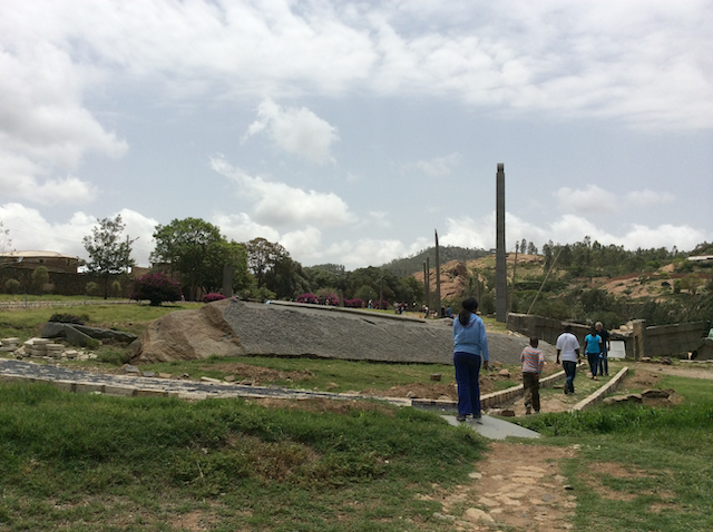 People walking at the site of Axum Obelisks